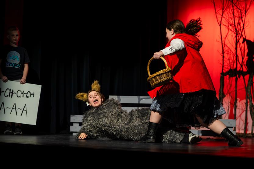 Students perform onstage